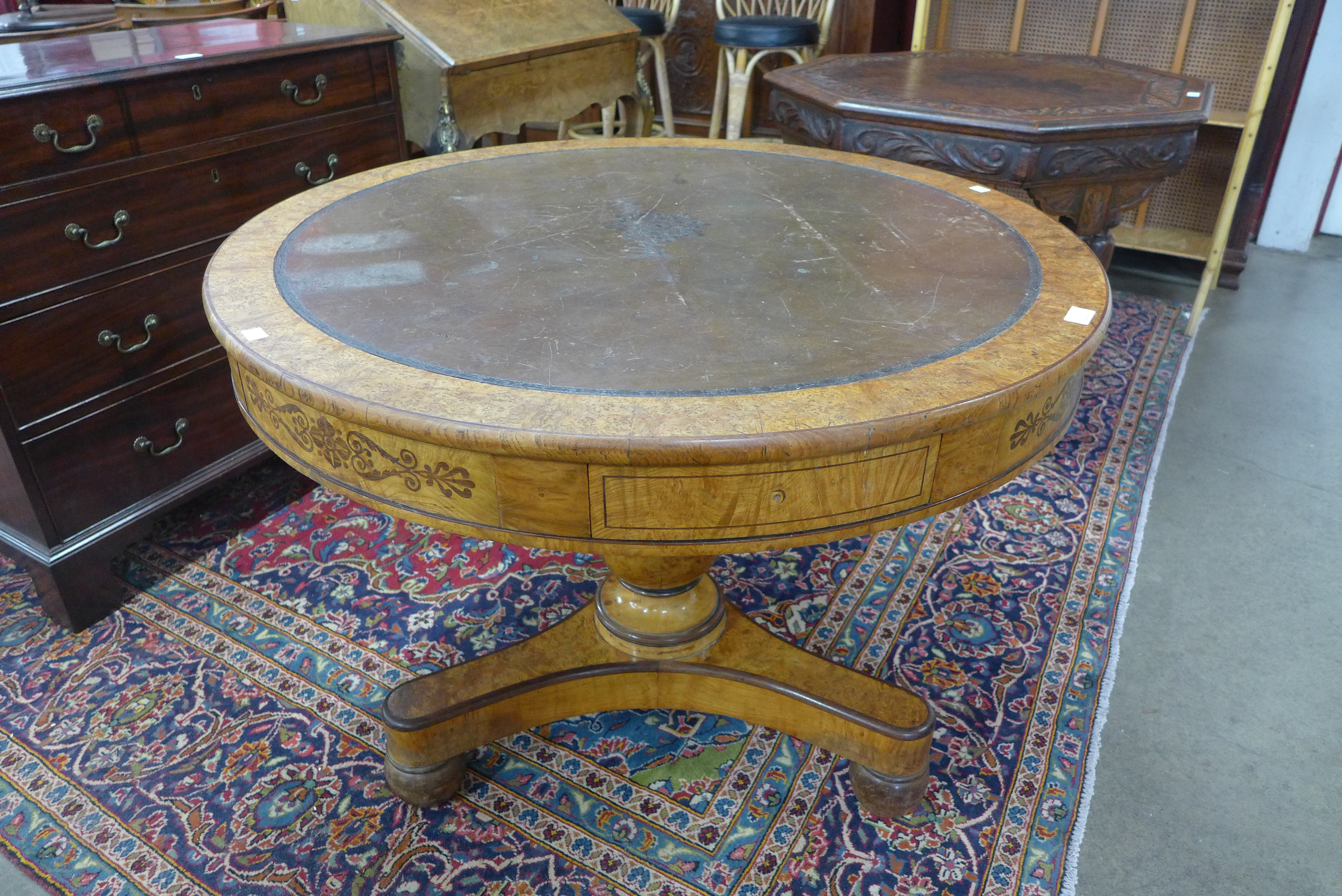 A Regency birds eye maple and leather topped drum shaped library table, manner of George Bullock - Image 2 of 4