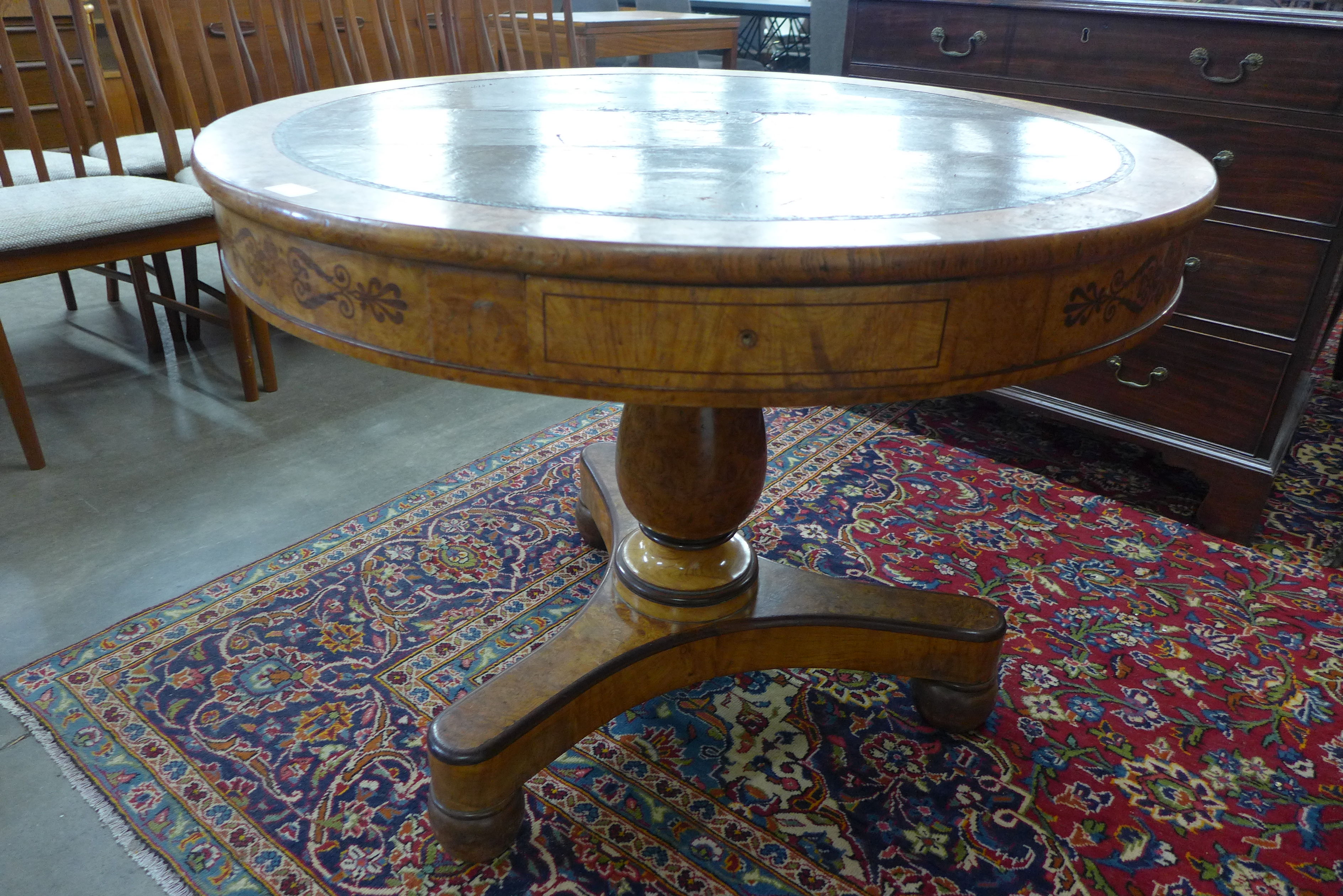 A Regency birds eye maple and leather topped drum shaped library table, manner of George Bullock - Image 4 of 4