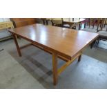 A Staverton teak dining table