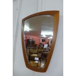 A teak framed mirror