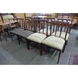 A set of eight Younger teak dining chairs