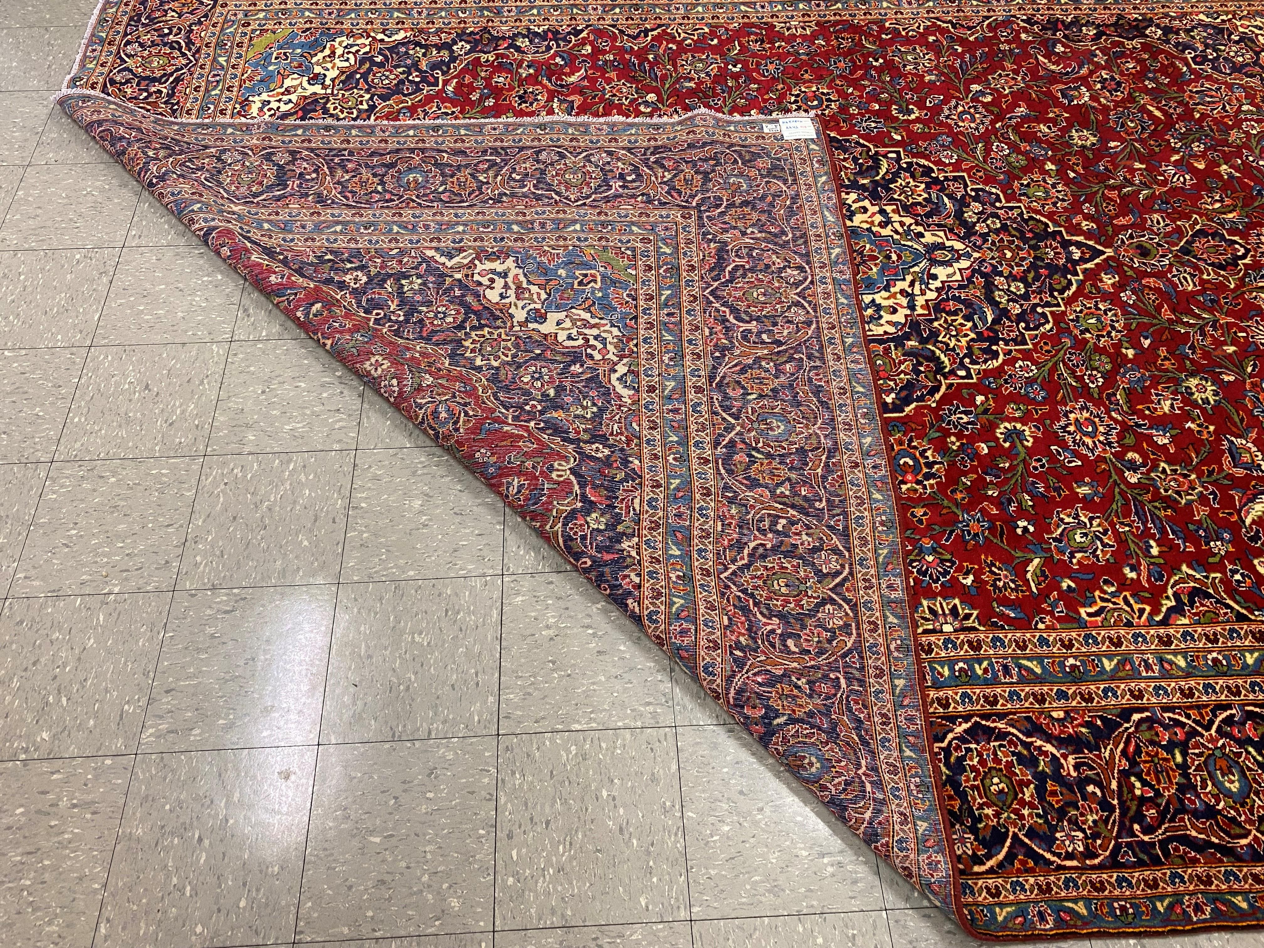 A large Persian red ground Kashan rug, 409 x 294cms - Image 2 of 2