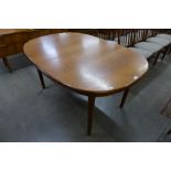 A McIntosh teak extending dining table