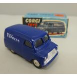 A Corgi Toys no.403 12cwt Delivery Van comprising of dark blue body with flat spun hubs and Daily