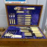 An oak cased canteen of cutlery, incomplete