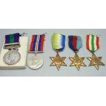 A set of five WWII medals including Palestine General Service medal to E.E. Clinton D.S.O., boxed,