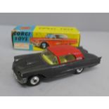 A Corgi Toys no.214S Ford Thunderbird, hard top metallic grey body with red roof and lemon interior,