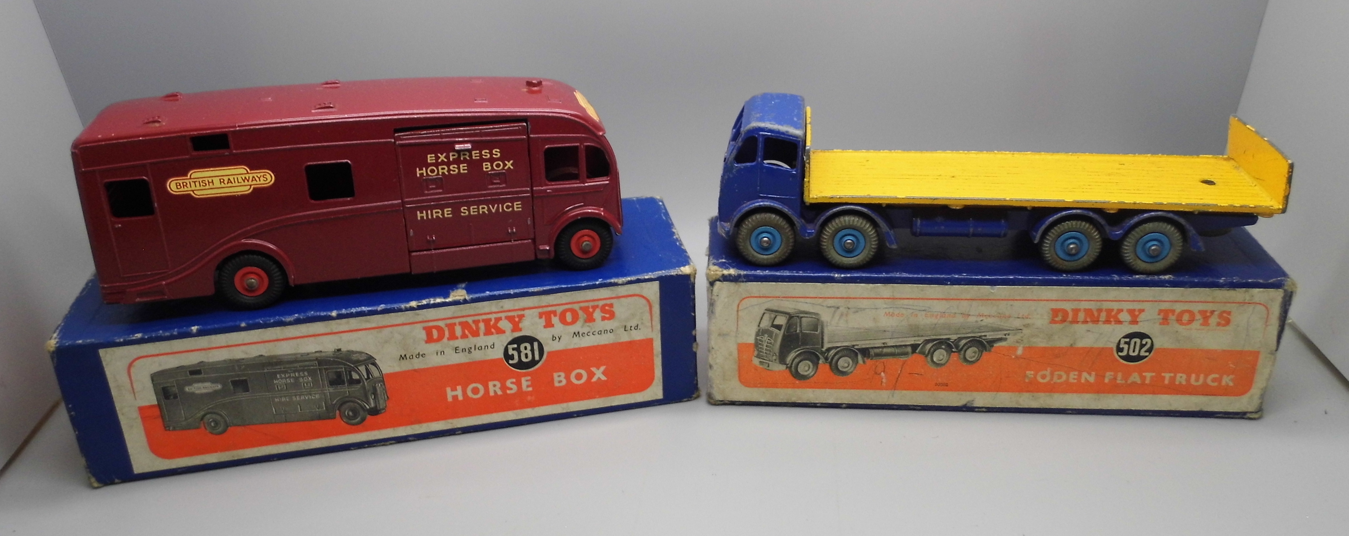 Two Dinky Toys model vehicles:- no. 581 Horse Box and a no. 502 Foden Flat Truck, no. 502