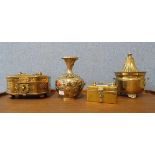 A Victorian brass orange squeezer, a pierced brass casket and two others