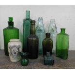 A collection of seven vintage glass bottles, etc.
