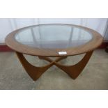 A G-Plan Astro teak and glass topped circular coffee table