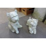 Two concrete Scottie dog garden ornaments