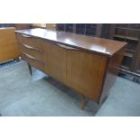 An Elliots of Newbury tola wood sideboard