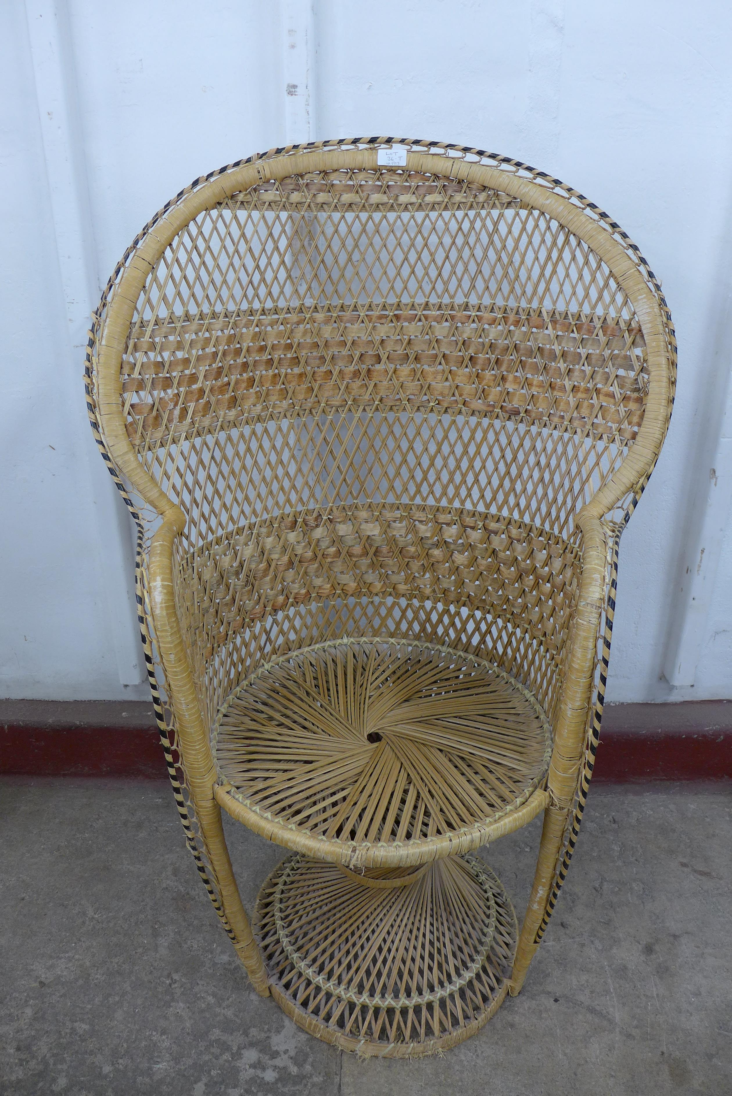 An Italian wicker peacock chair