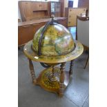 A terrestrial globe cocktail cabinet/trolley