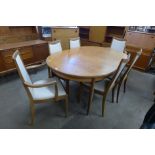 A G-Plan Fresco teak extending dining table and six chairs