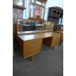 A D.B.S. teak dressing table