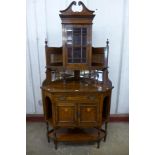 An Edward VII inlaid rosewood freestanding splay front corner cabinet