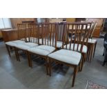 A set of eight McIntosh teak dining chairs