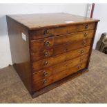 A Victorian oak six drawer watchmaker's cabinet