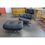 A Charles & Ray Eames style simulated rosewood and black leather revolving lounge chair and ottoman