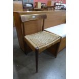 A Danish teak and paper cord seated chair
