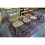 A set of six Ercol Blonde elm and beech 392 adult model stacking chairs