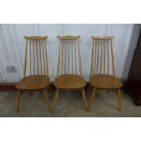 A set of three Ercol Blonde elm and beech Goldsmith chairs
