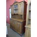 A 19th Century Flemish carved oak Liege side cabinet