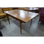 A Bath Cabinet Makers teak extending dining table