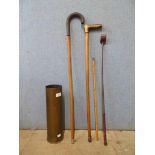 A 100mm shell case, tow walking sticks, a riding crop and a measure