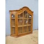 A Dutch style oak wall hanging display cabinet