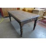 A Victorian oak two drawer farmhouse kitchen table