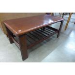 A simulated rosewood coffee table