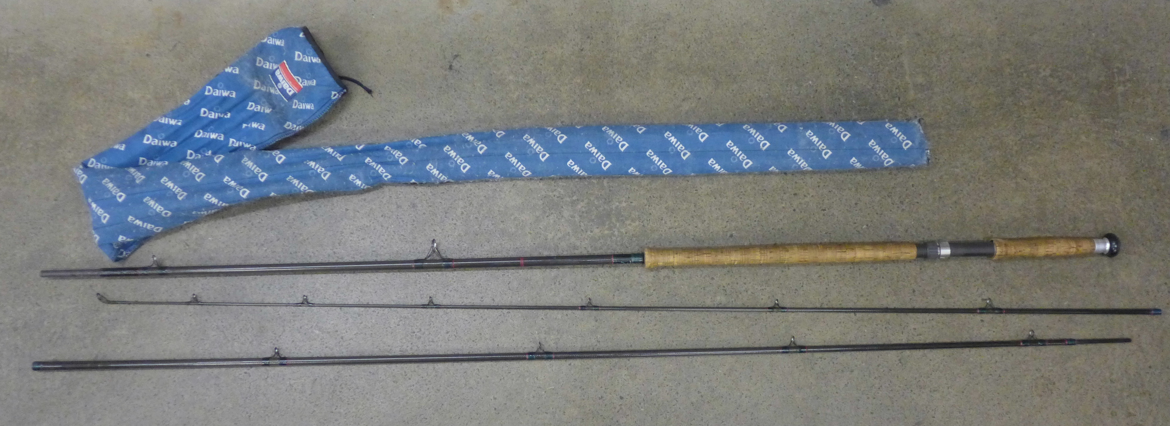 A Daiwa three piece salmon rod