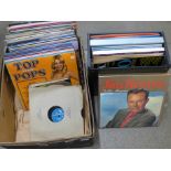 A collection of LP records and singles including ABBA, Boney M, Elvis Presley, Tom Jones and The