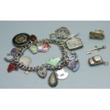 A silver charm bracelet and charm, 74g