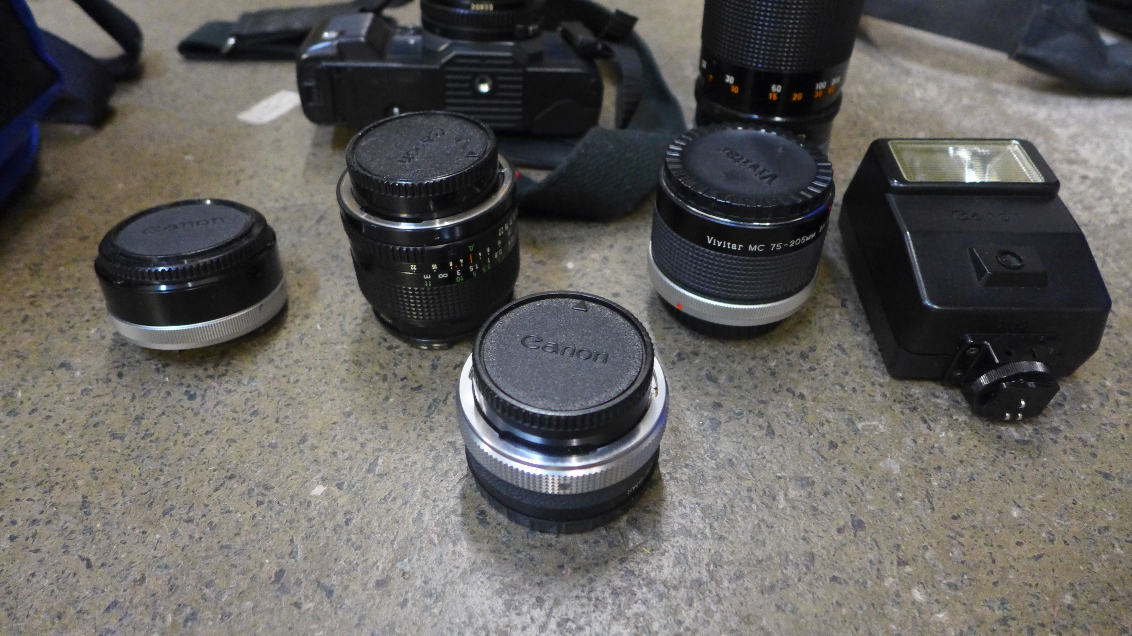 A Canon T70 35mm fim camera, two spare Canon lenses, 24mm and 300mm, an adaptor, Vivitor - Image 3 of 3