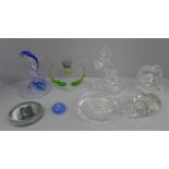 A collection of glass paperweights