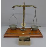 A set of De Grave, Short & Co. balance scales and weights