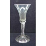 An 18th Century air twist goblet, circa 1740, the air twist extending into the solid base of the