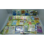 125 Holo and reverse holo Pokemon cards in protective sleeves including black star rares