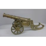 A brass model canon, 5.35kg