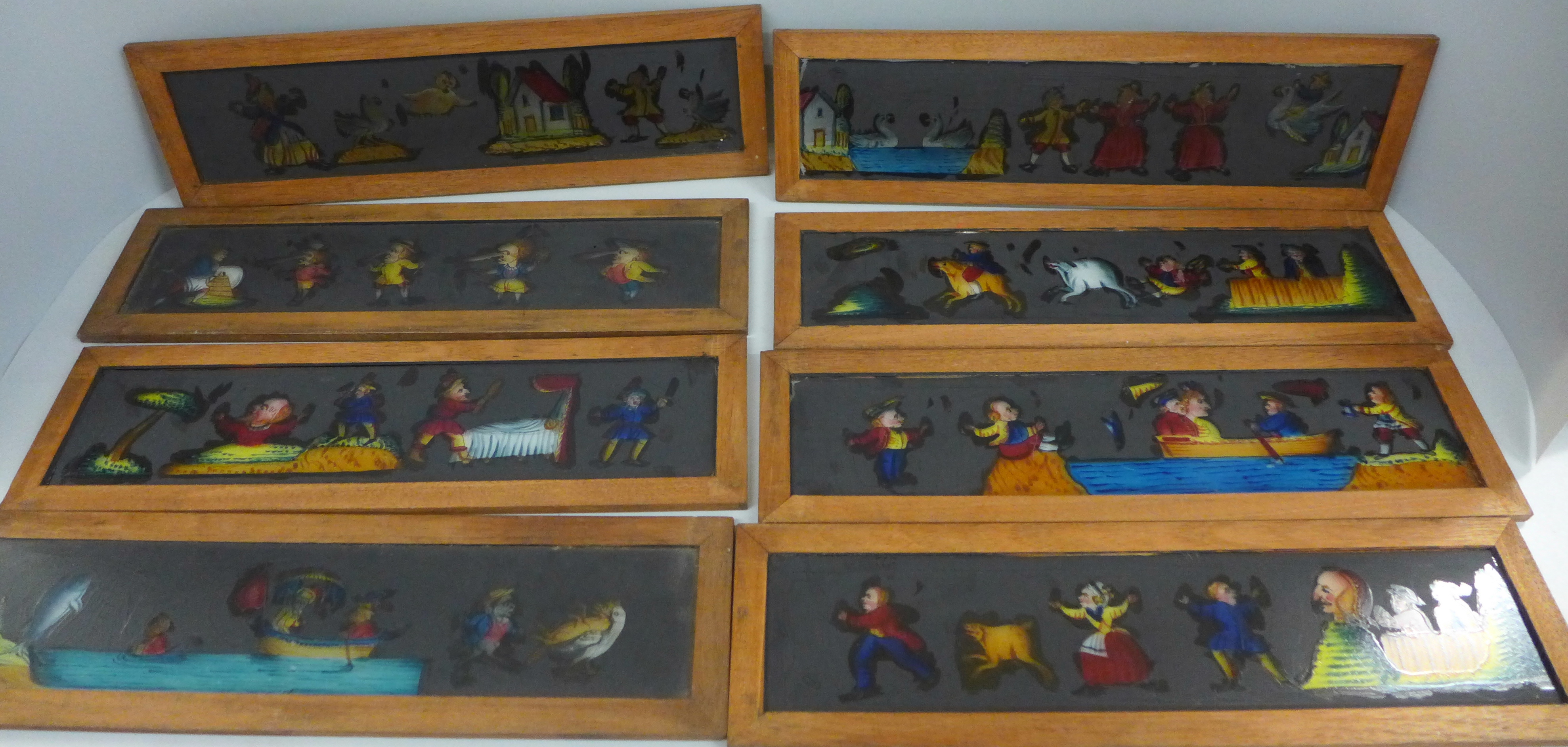 A box of lantern slides, two depicting nursery rhymes