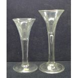 A wine glass, circa 1750, trumpet bowl over tiered stem over folded foot, 17.5cm with wine glass,