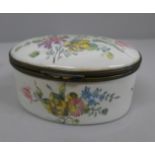 A 19th/early 20th Century enamelled oval trinket box