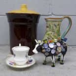 A Denby Glyn Colledge jug, foot a/f, a Rumtoft jar, a novelty cow figure, a/f, and a cup and