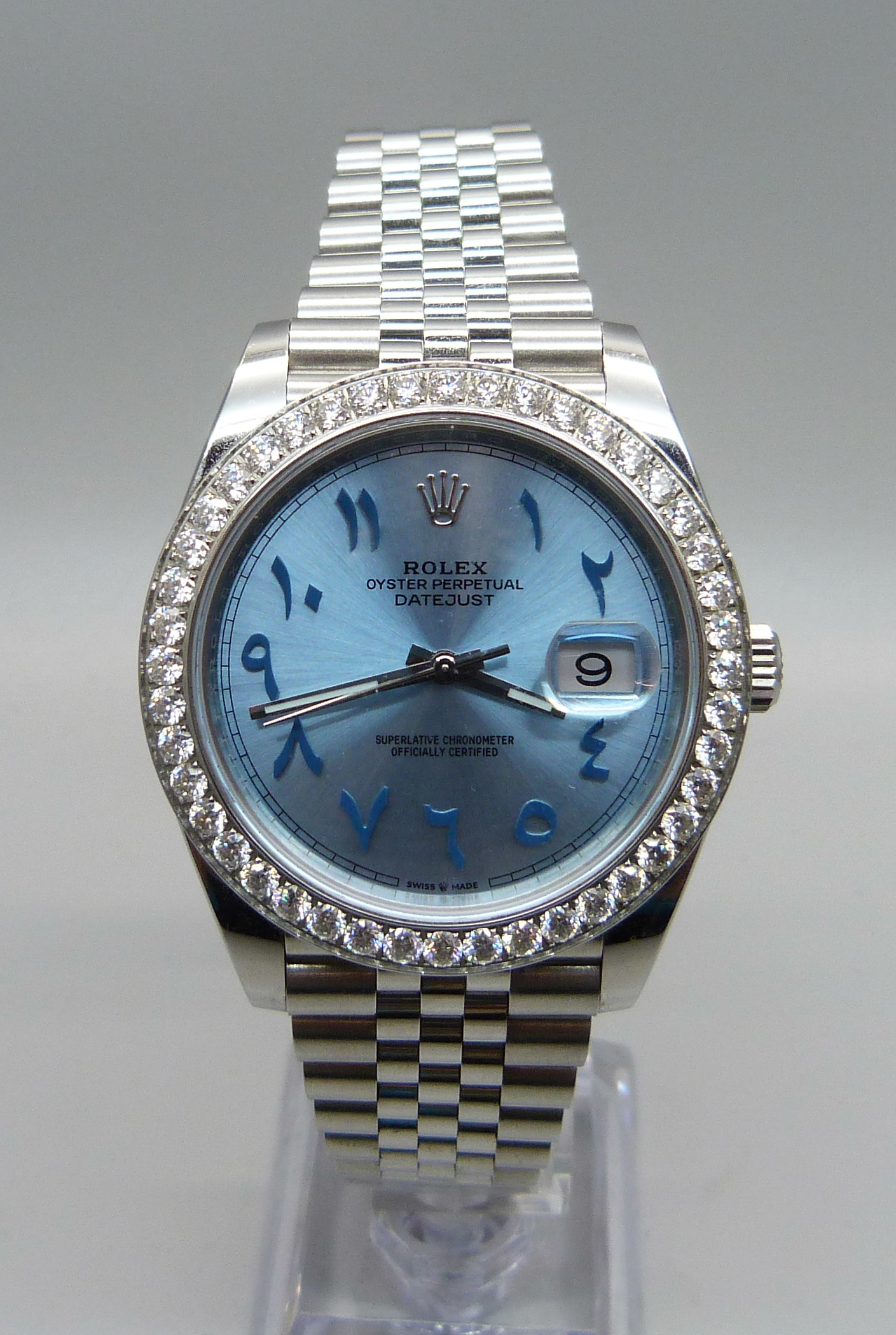 A Rolex Oyster Perpetual Datejust wristwatch with aftermarket custom ice blue dial and Arabic