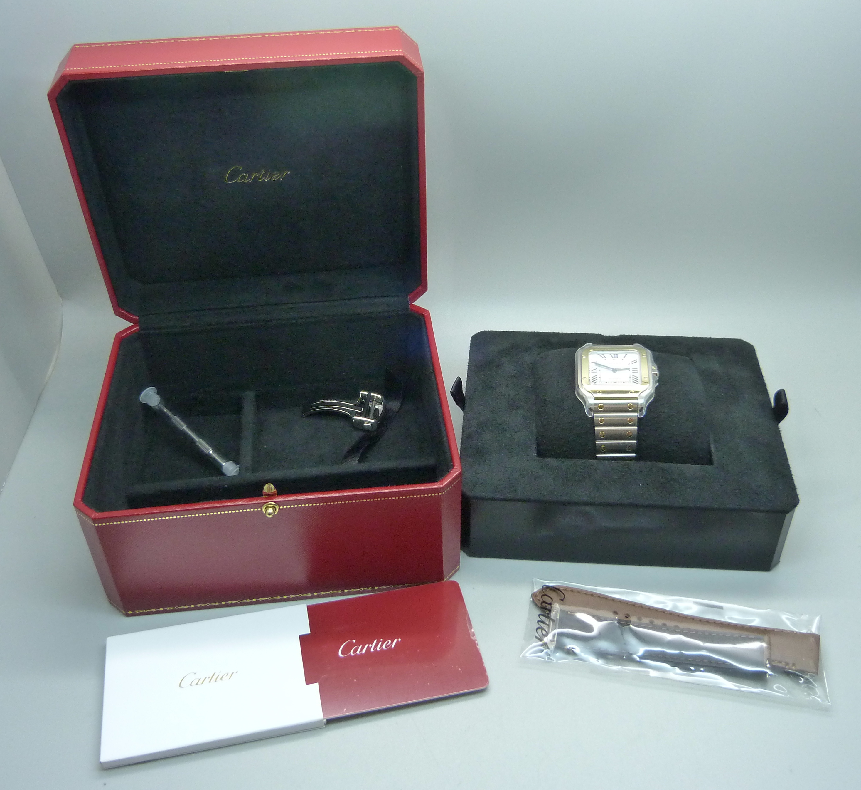 A Santos de Cartier steel and yellow gold wristwatch, with spare straps and buckle, with box and - Image 7 of 8