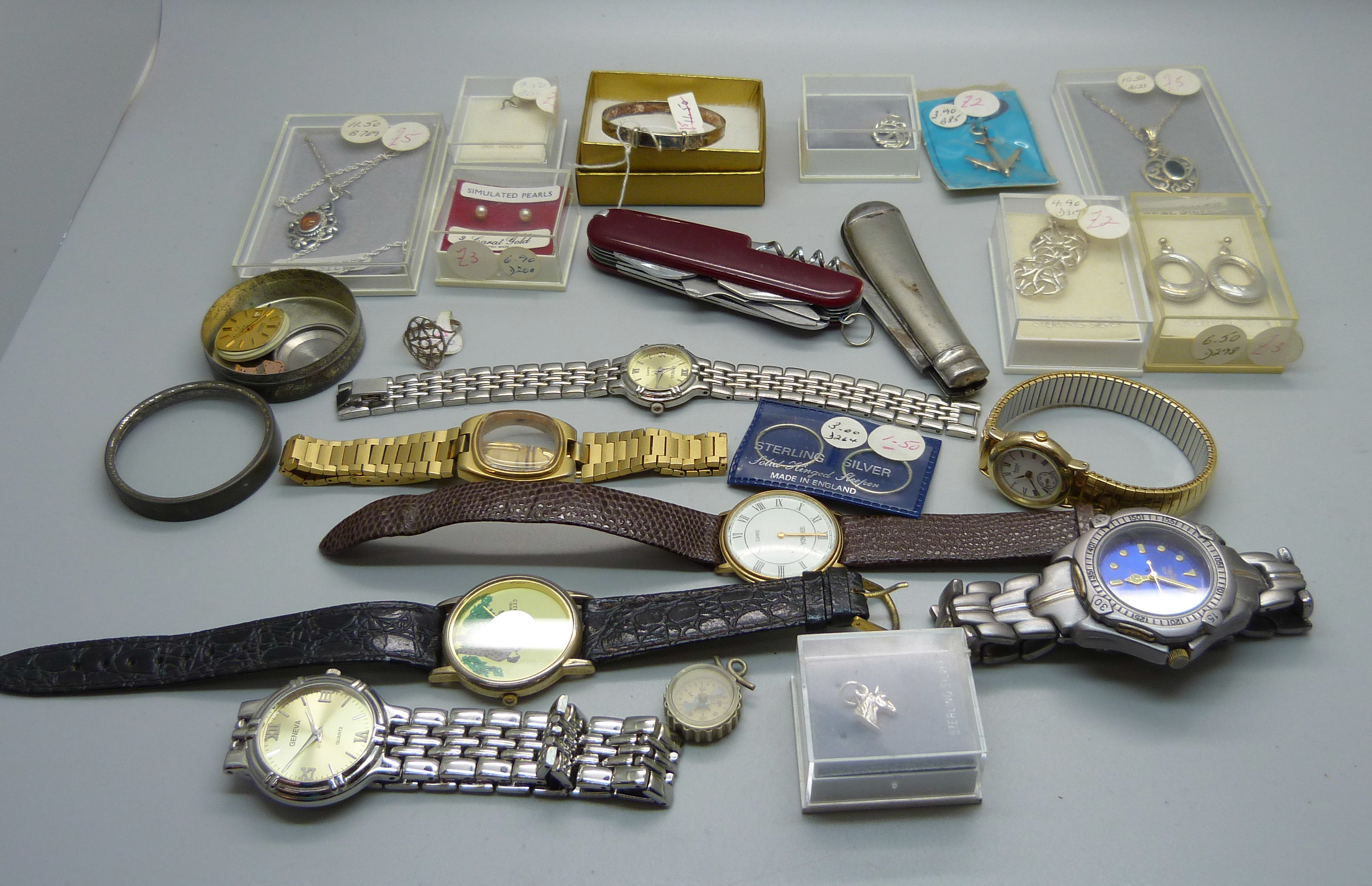 A collection of wristwatches, including lady's Omega for repair, silver jewellery and penknives